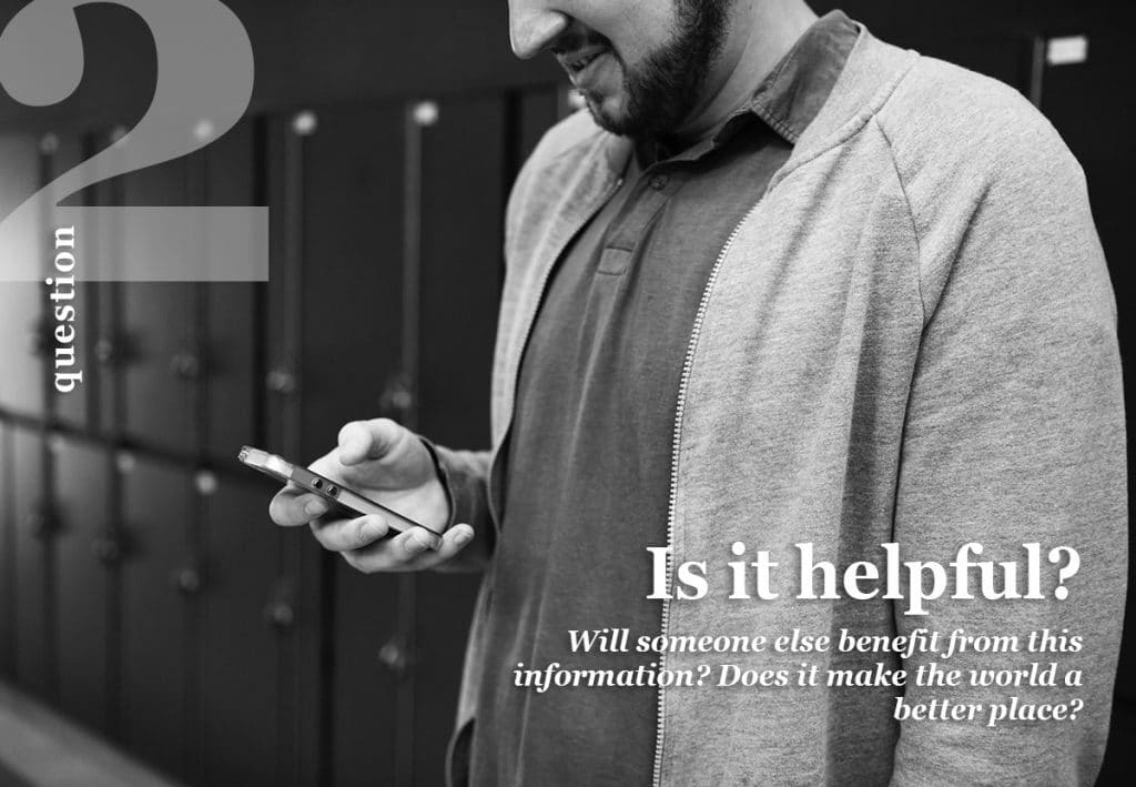 A man holding a cell phone with the words "Is it helpful?"
